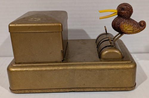 Mechanical bird cigarette - mechanical,